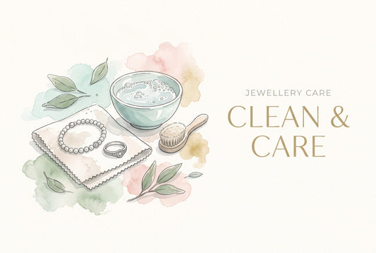 Illustration of a silver beaded bracelet and ring on a polishing cloth beside a bowl of soapy water and a soft brush