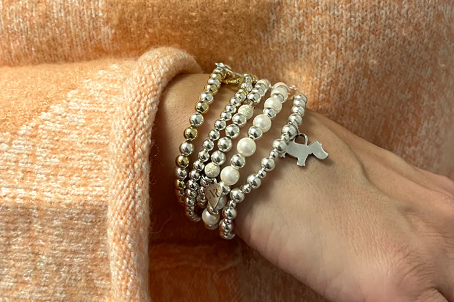 The Art of Bracelet Stacking: A Comprehensive Guide to Wearing Multiple Styles at Once!